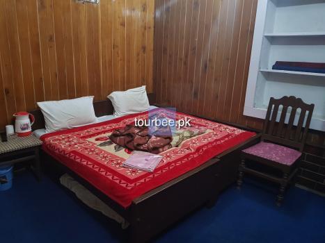 Master Bedroom-1inNew Parbat Hotel-guestkor_com