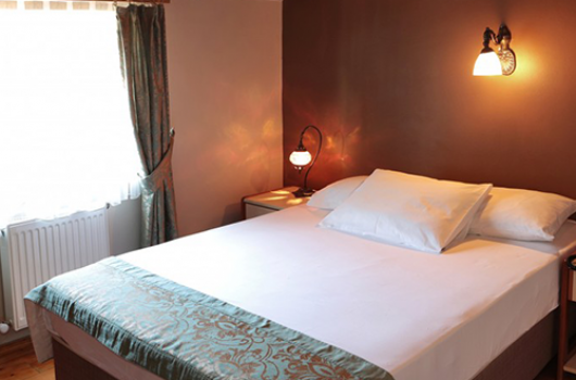 Master Bedroom-1inGhizer Blossom Inn Hotel-guestkor_com