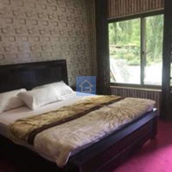 Master Bedroom-1inHills n Huts Minapin Nagar-guestkor_com