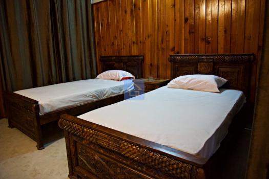 Triple Bedroom-1inMadyan Hotel-guestkor_com